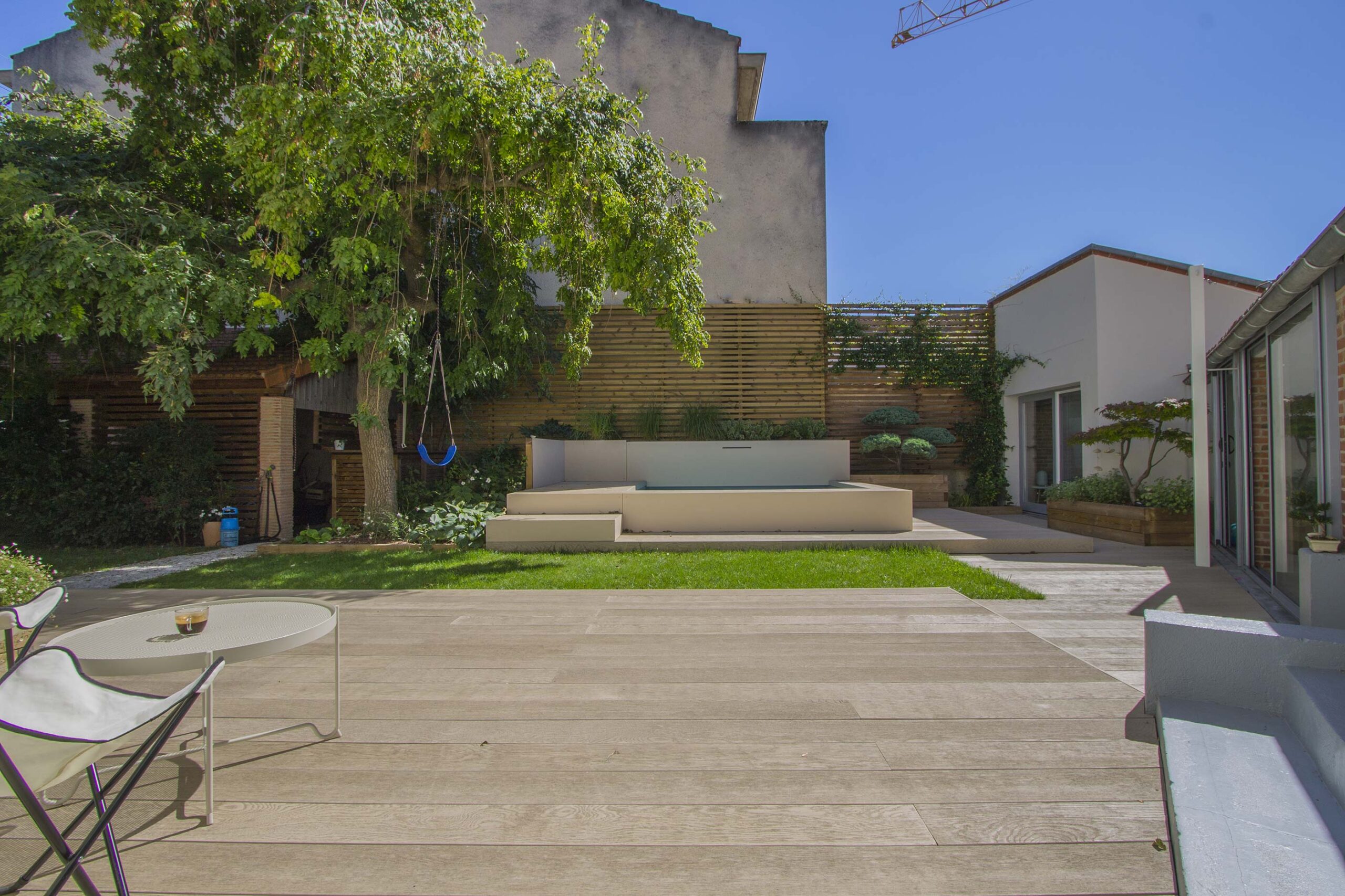 Espace piscine avec terrasse en lames Ansyears
